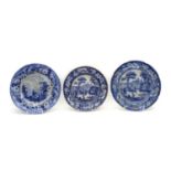 A large quantity of English blue and white china bowls and plates,