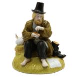 A glazed Gardner porcelain figure of a tramp,