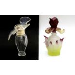 Two glass scent bottles and covers,