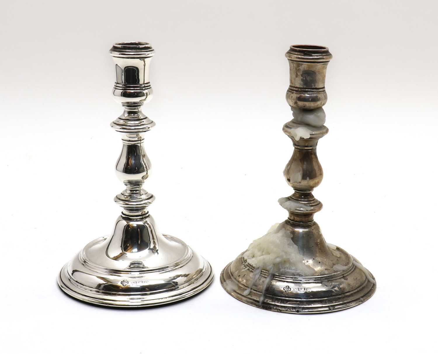 A pair of modern silver candlesticks