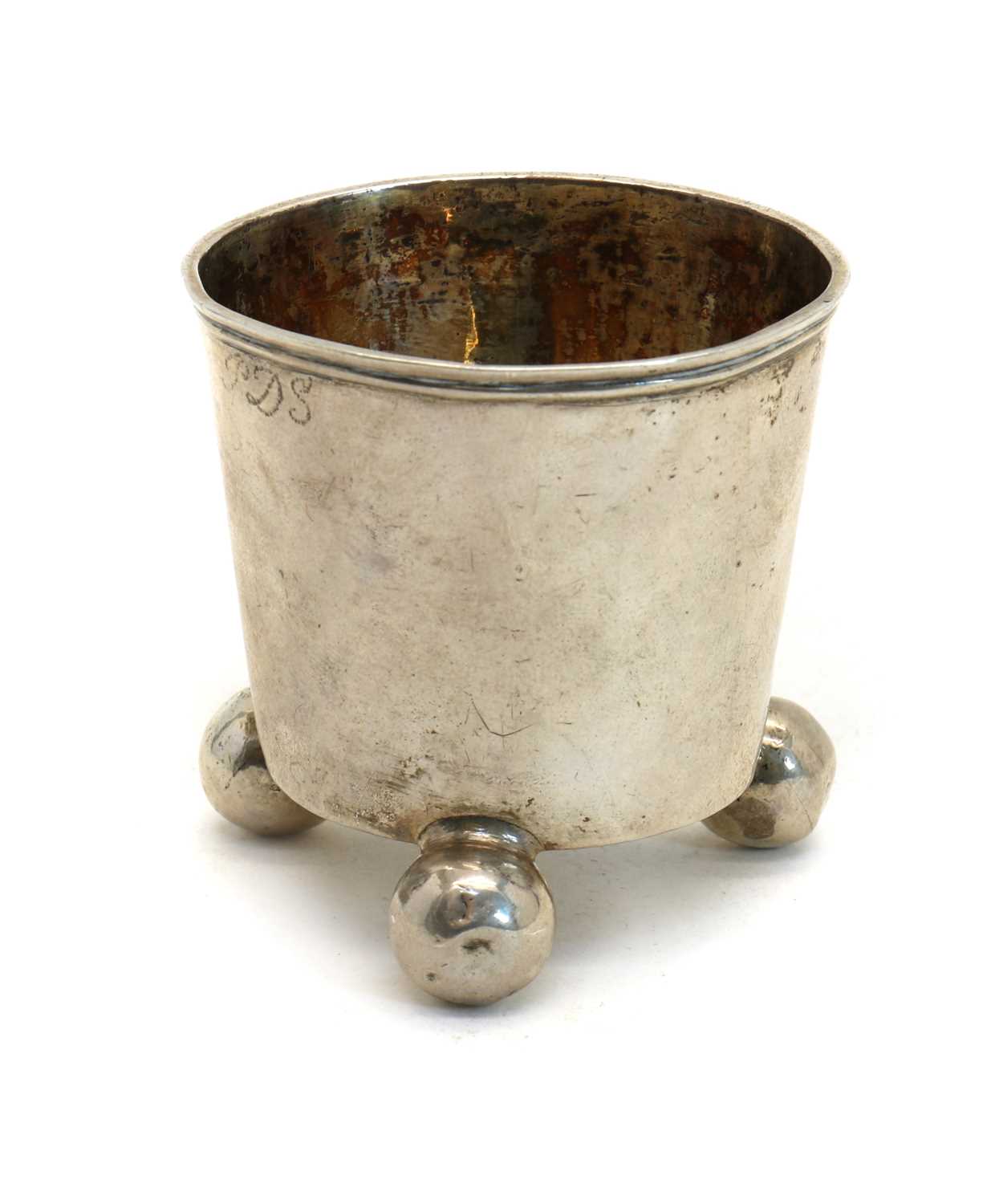 A silver tumbler,