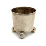 A silver tumbler,