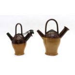 A pair of Royal Doulton pottery Old Sarum kettles