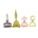 A collection of four Art Deco perfume bottles,