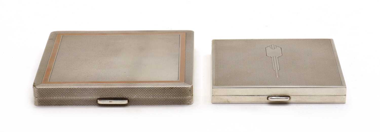Two silver compacts,