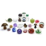 A collection of paperweights,