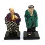 A pair of Royal Venton Ware pottery figures,