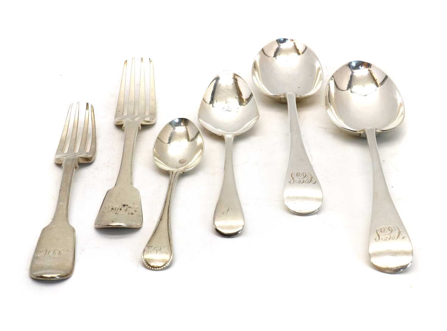 A collection of George III and later silver flatware