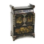 A Japanese gilt lacquered table cabinet,