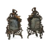 A pair of silver plated Art Nouveau easel back mirrors,