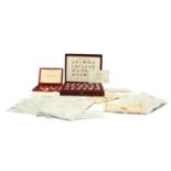 A cased set of The Coronation Issue silver gilt stamps,