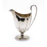 A George III silver cream jug