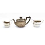 An Edwardian silver three piece tea service