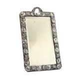 An Edwardian silver-mounted table mirror,