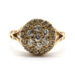 An 18ct gold diamond cluster ring,