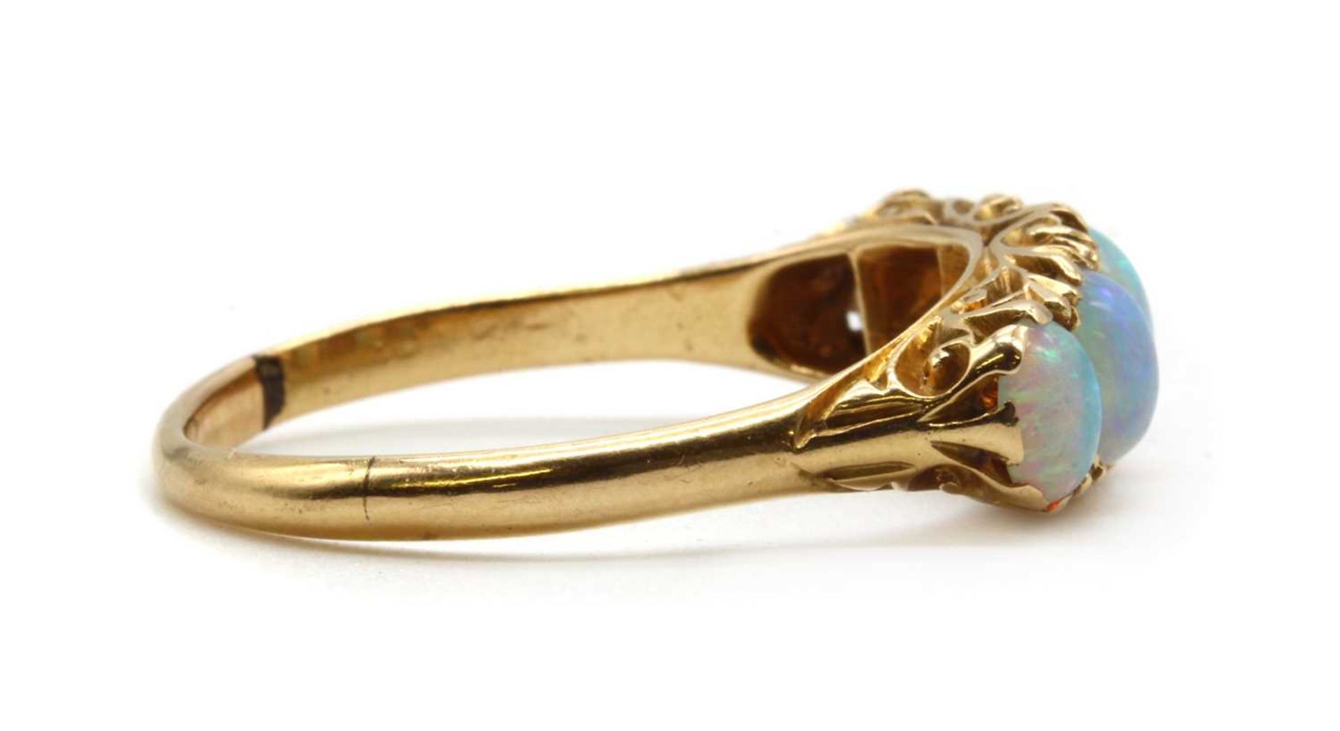 An 18ct gold five stone opal ring, - Bild 2 aus 3
