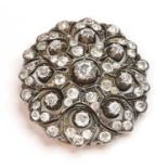 A Victorian diamond set oval cluster brooch/pendant, c.1880,