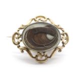 A Victorian gold memorial brooch,