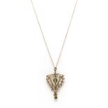 An Edwardian gold peridot and split pearl pendant,