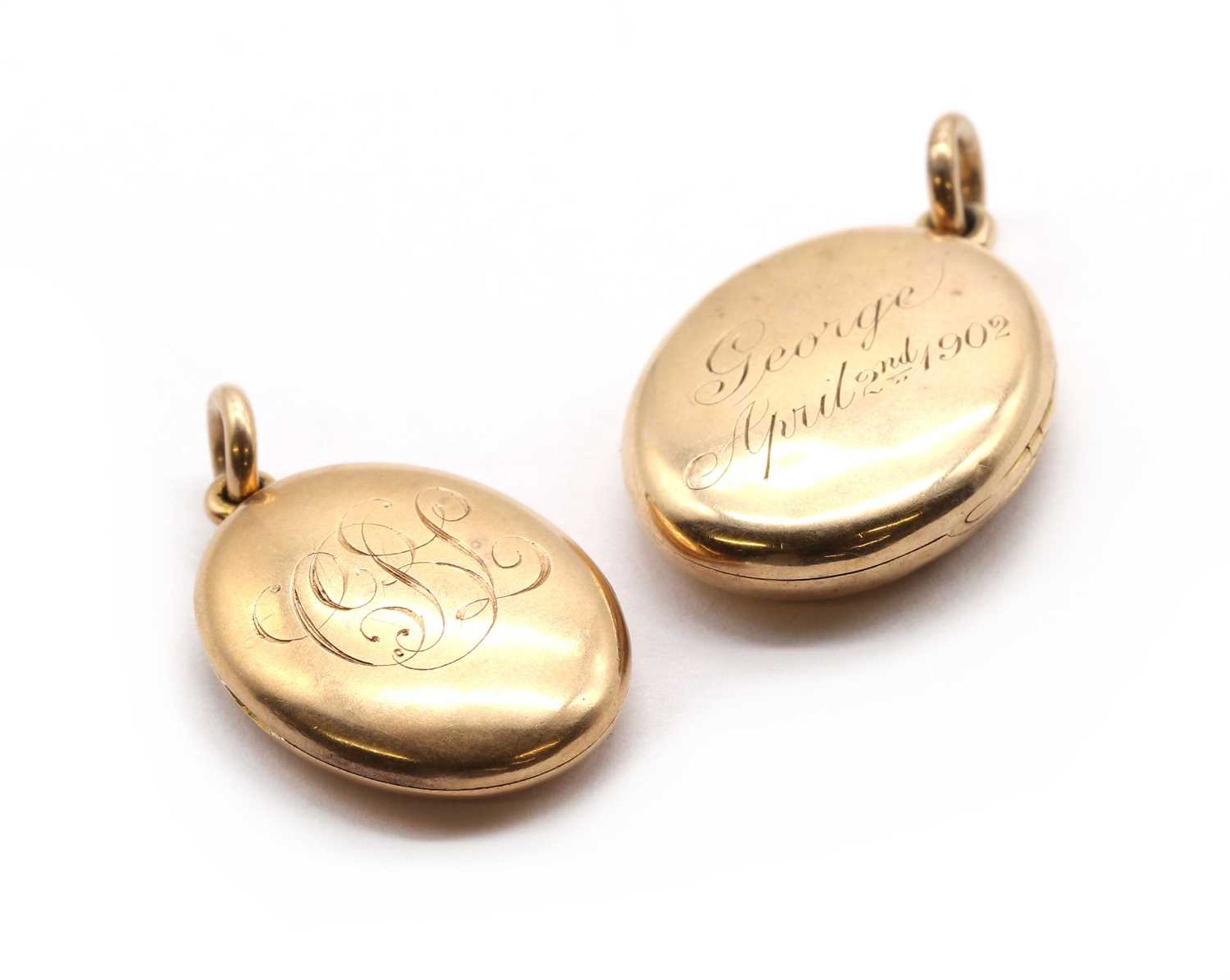 Two Edwardian gold lockets,