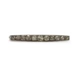 An old cut diamond bar brooch,