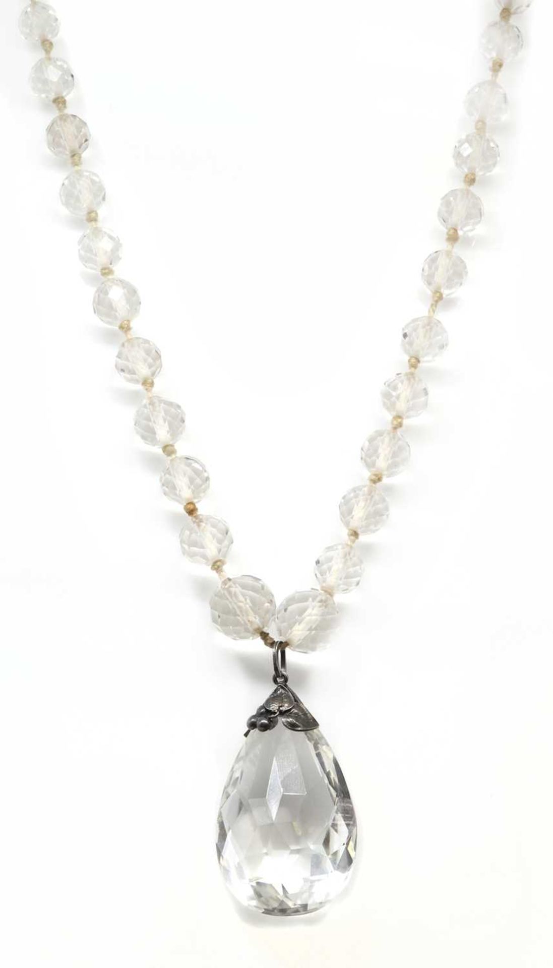 An Arts & Crafts silver rock crystal quartz pendant,