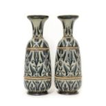 A pair of Doulton Lambeth vases,