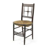 An ebonised Arts and Crafts ash side chair,