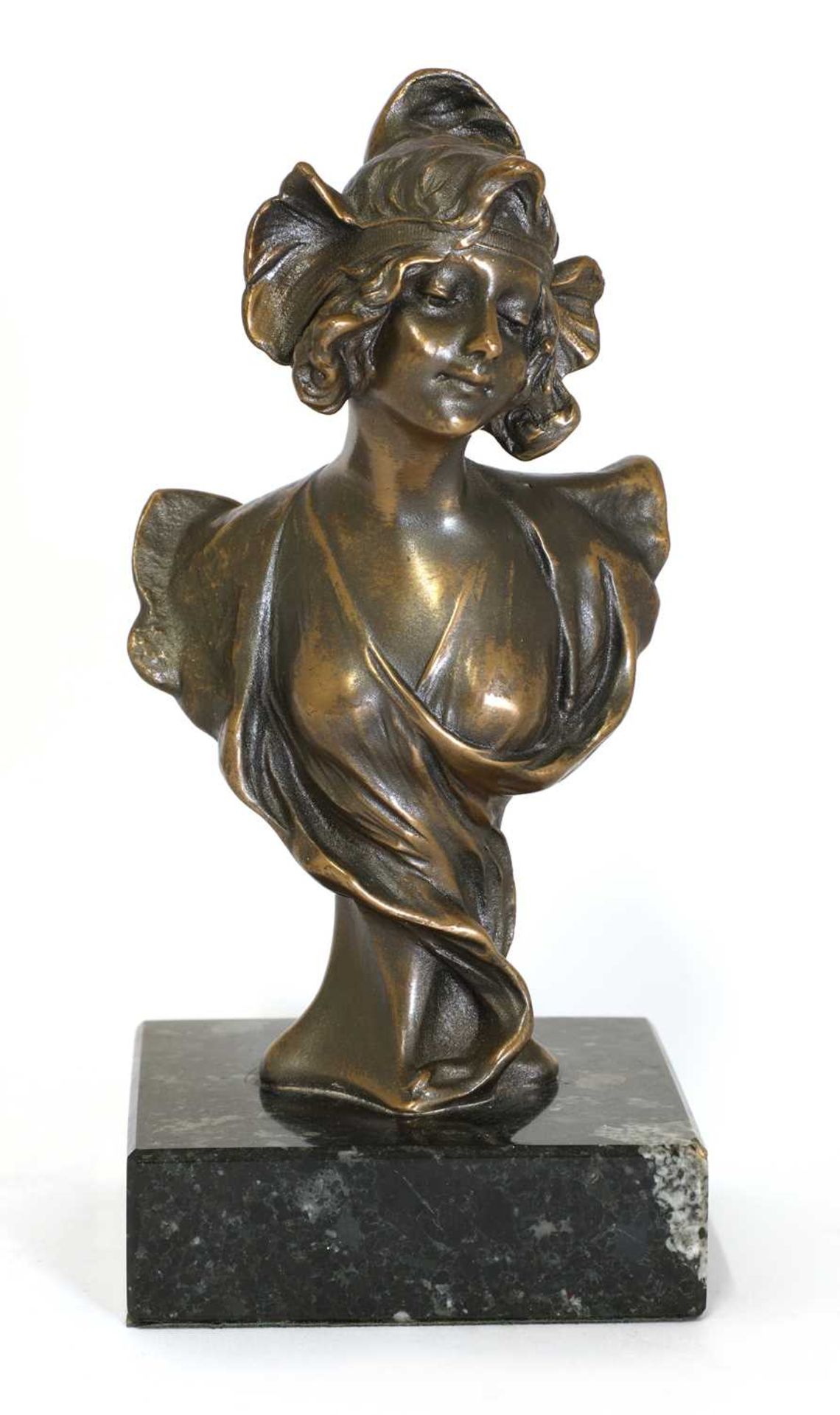 An Art Nouveau bronze bust of a lady,