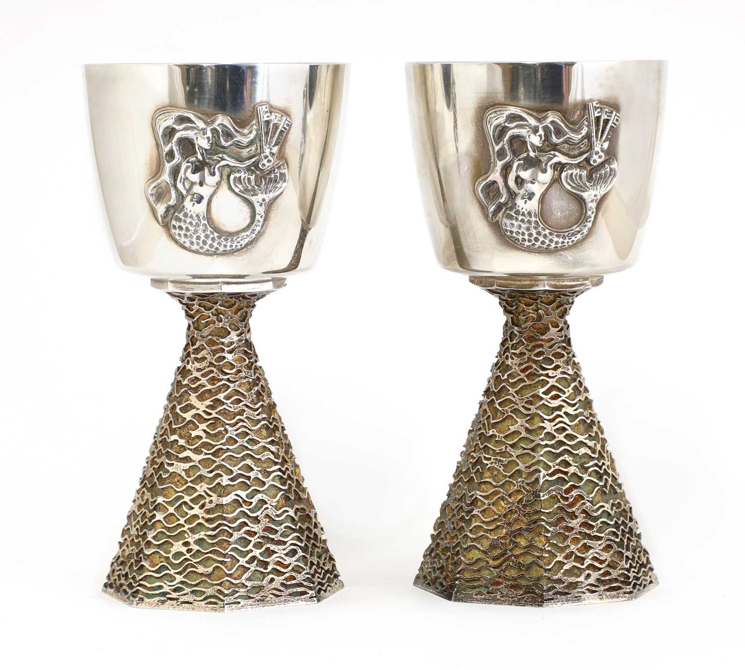 A pair of silver-gilt Ely Cathedral commemorative goblets,