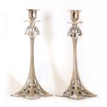 A pair of WMF silver-plated candlesticks,