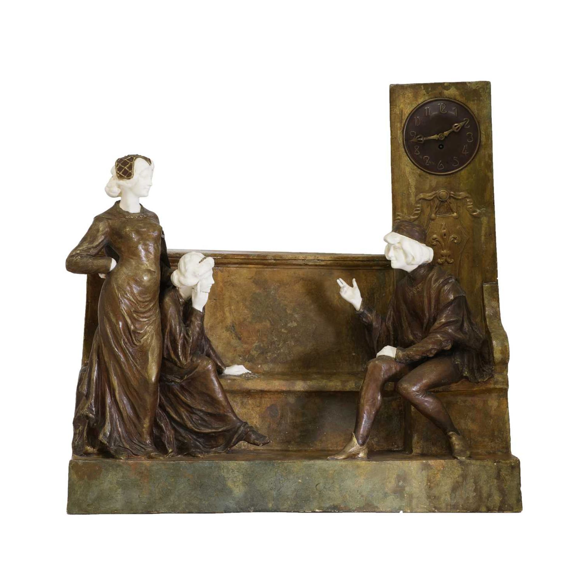A large Goldscheider painted terracotta clock,