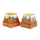 A pair of Clarice Cliff 'Gayday' ziggurat candleholders,