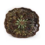 A Linthorpe mottled majolica lily-pad-shaped dish,