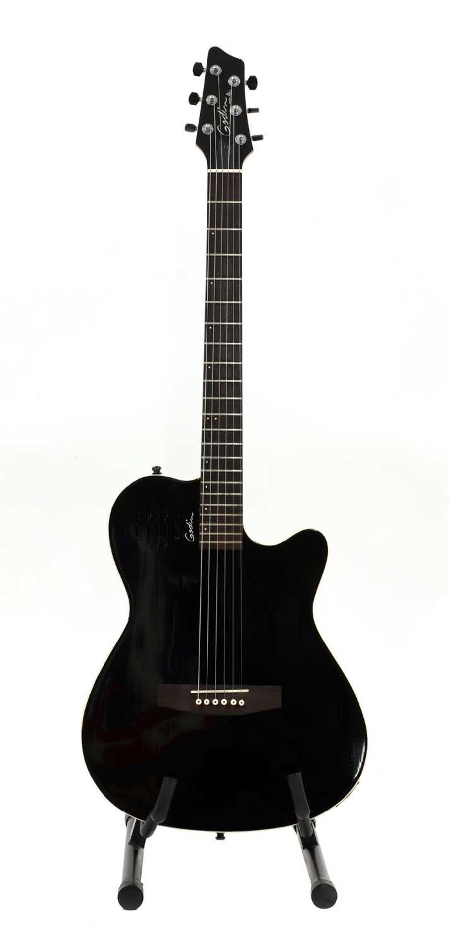 A 2004 Godin A6 electro acoustic guitar,