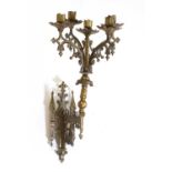 A Gothic brass wall light,