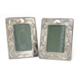 A pair of silver photograph frames,