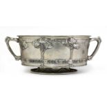 An Arts and Crafts twin-handled Tudric pewter rose bowl,