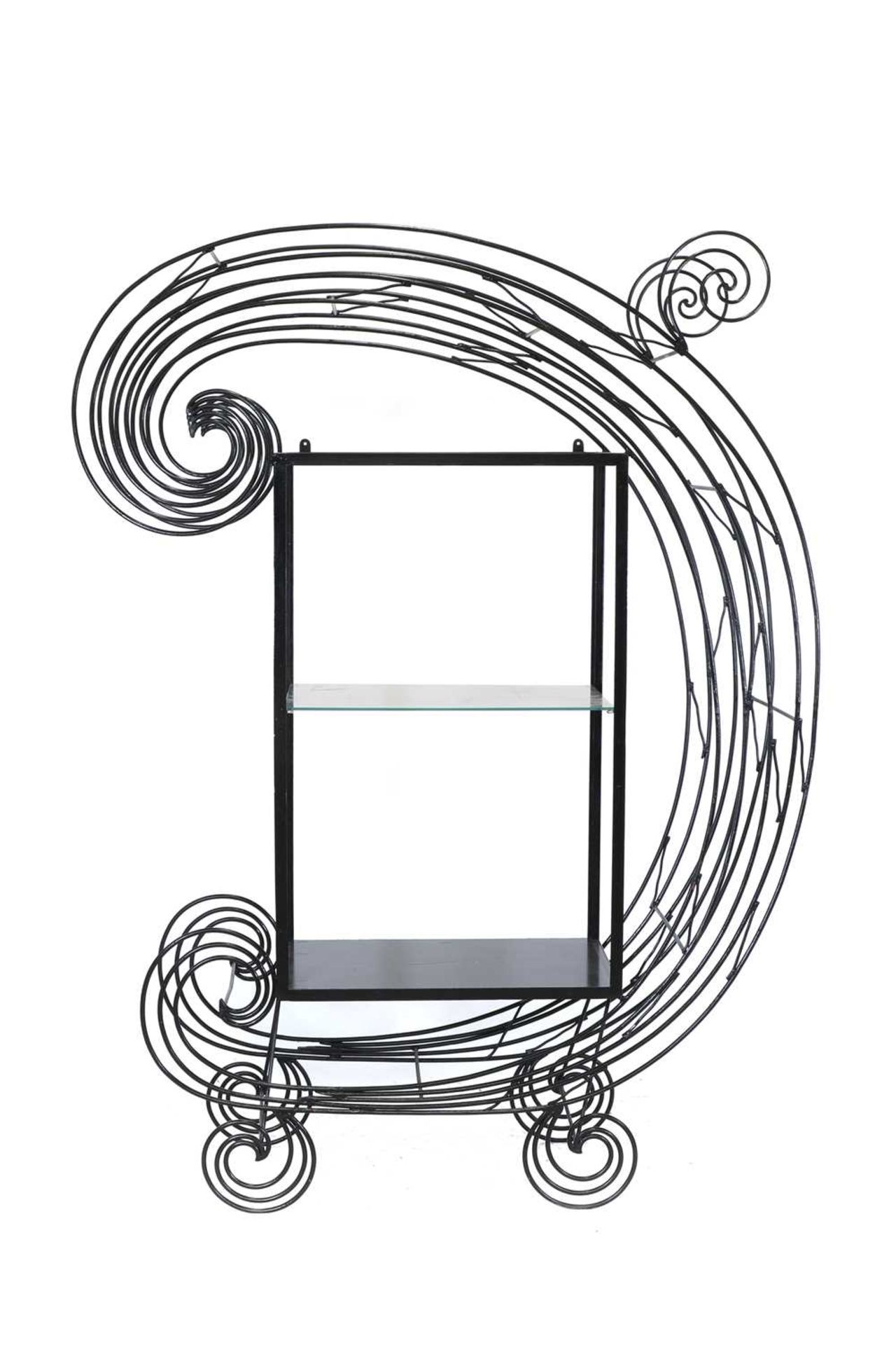 A wrought iron display stand,