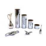 A set of four silver-plated candleholders,