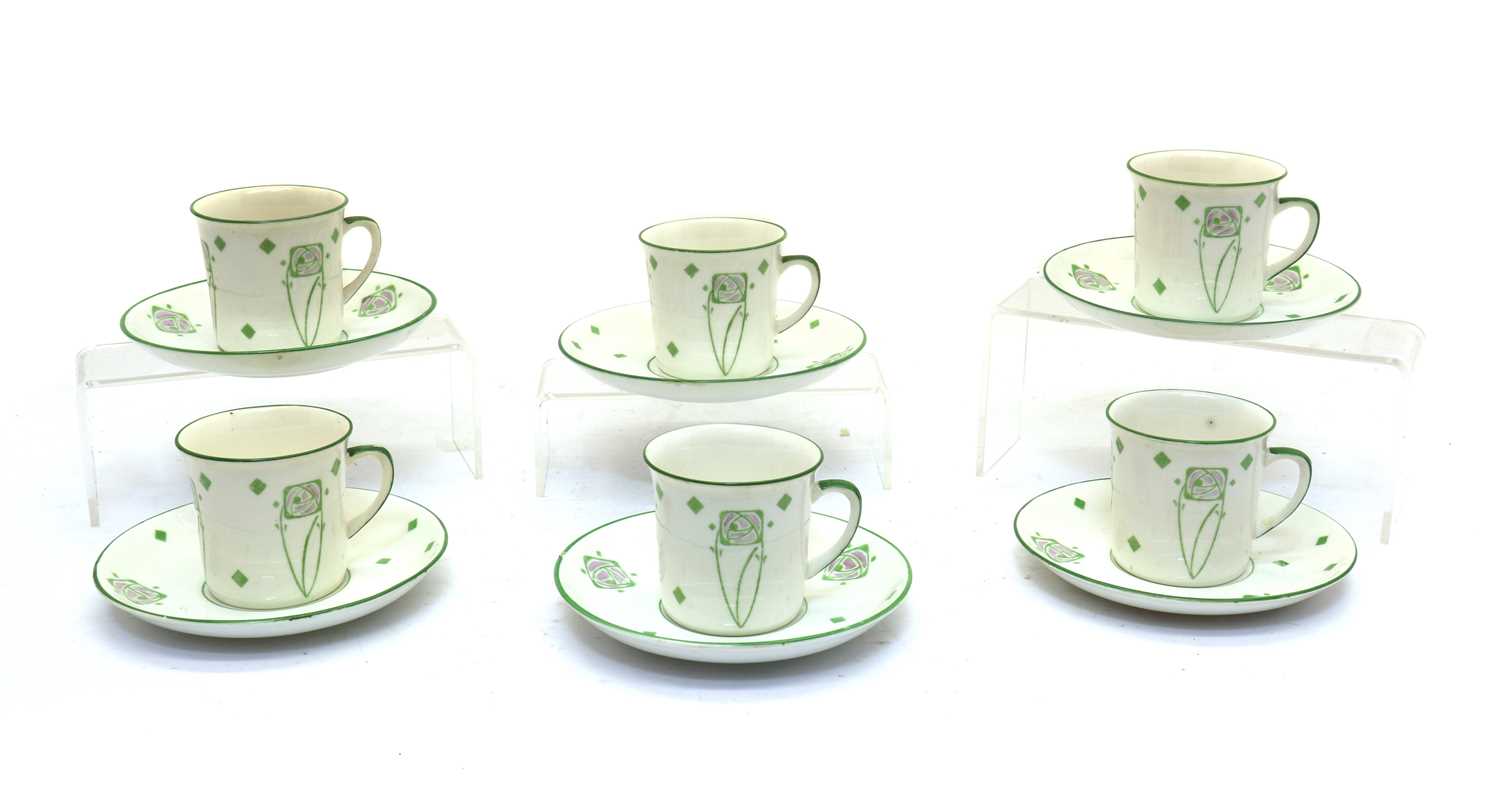 A set of six Foley Art China 'Peacock Pottery' coffee cups and saucers,
