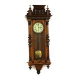 A walnut cased Vienna regulator wall clock,