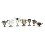 A collection of silver sporting cups and trophies