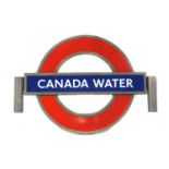 A London Underground enamel and cast sign 'Canada Water',