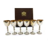 A set of six commemorative silver goblets,