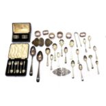 A collection of silver flatware,