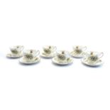 A set of six Queen Anne 'Lady Luck' porcelain coffee cups and saucers,