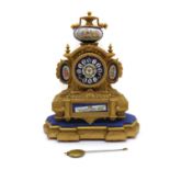 A French gilt metal and porcelain mounted mantel clock on stand,