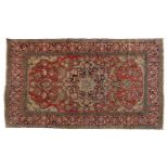 An antique Isfahan rug,