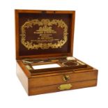 A Winsor & Newton paint box,